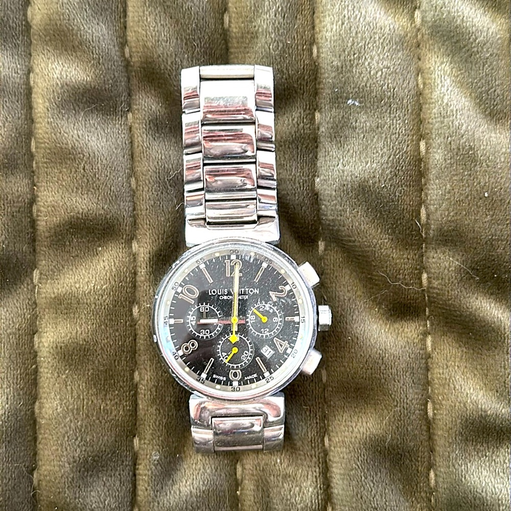 Louis Vuitton men’s watch in fair condition.